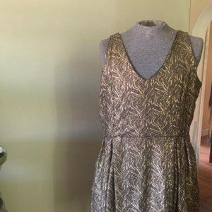 Plus size gold metallic and black print mini dress